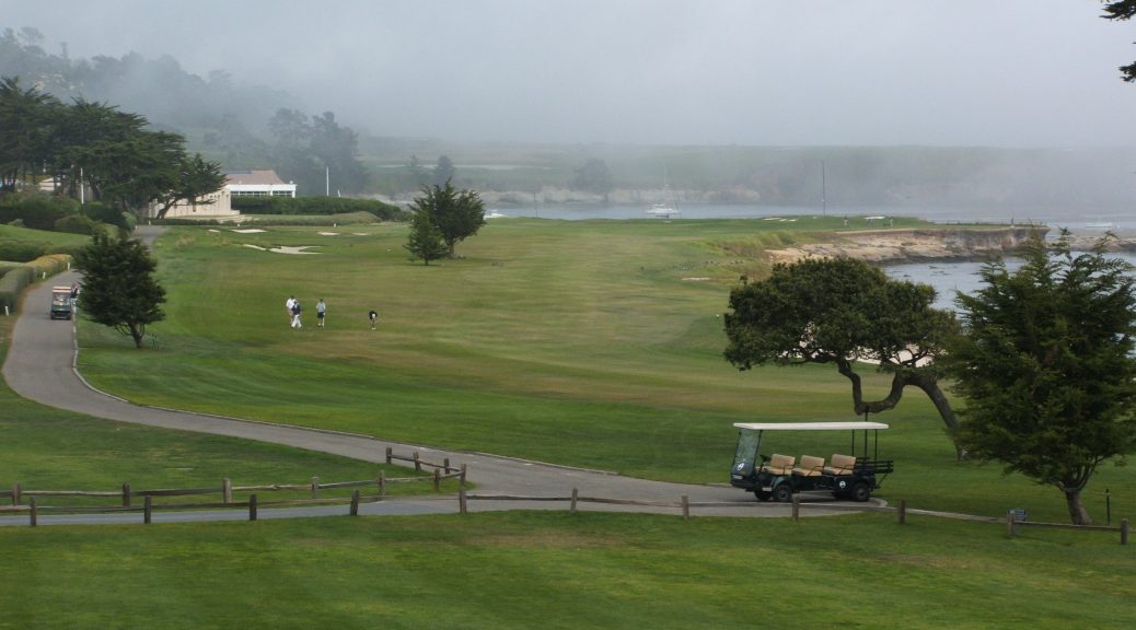 Beautiful golf course green with scenic landscape